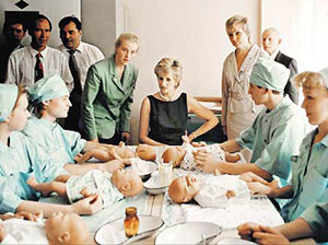Britain's Princess of Wales talks to paediatric nurses who are learning medical skills on rubber baby models during a visit by the Princess Friday June 16, 1995 to the Tushinskaya Children's Hospital in Moscow. Princess Diana, who is patron of the hospital's Trust, is on a two day official visit to the Russian capital. (AP Photo/pool)