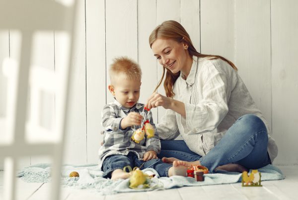 Mother with son at home prepare to easter